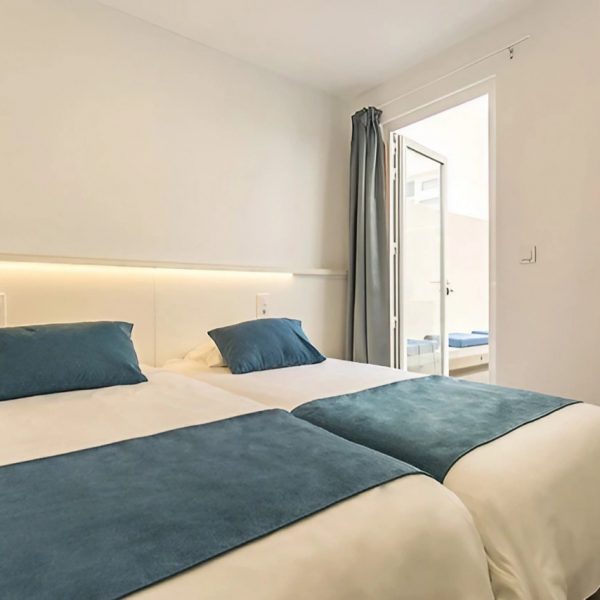 Camas apartamentos Campamento Club La Santa